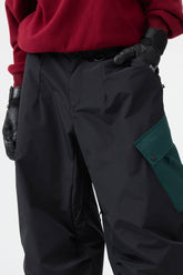 Pantalones de nieve holgados con bolsillos cargo y diseño en bloques de color negros para mujer